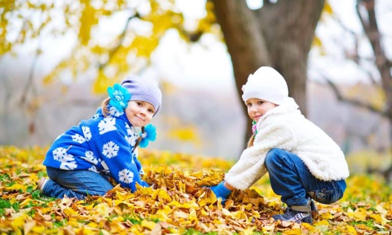 Kids picking up leaves