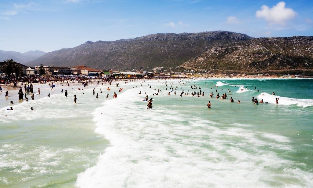 People enjoying a beach day in the summer