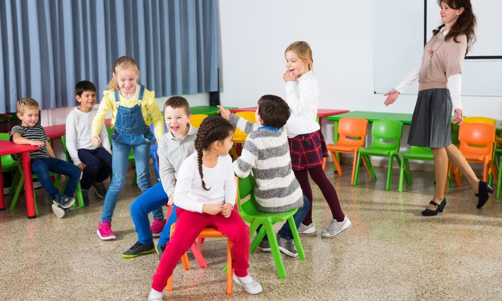 Play dancing chairs with kids